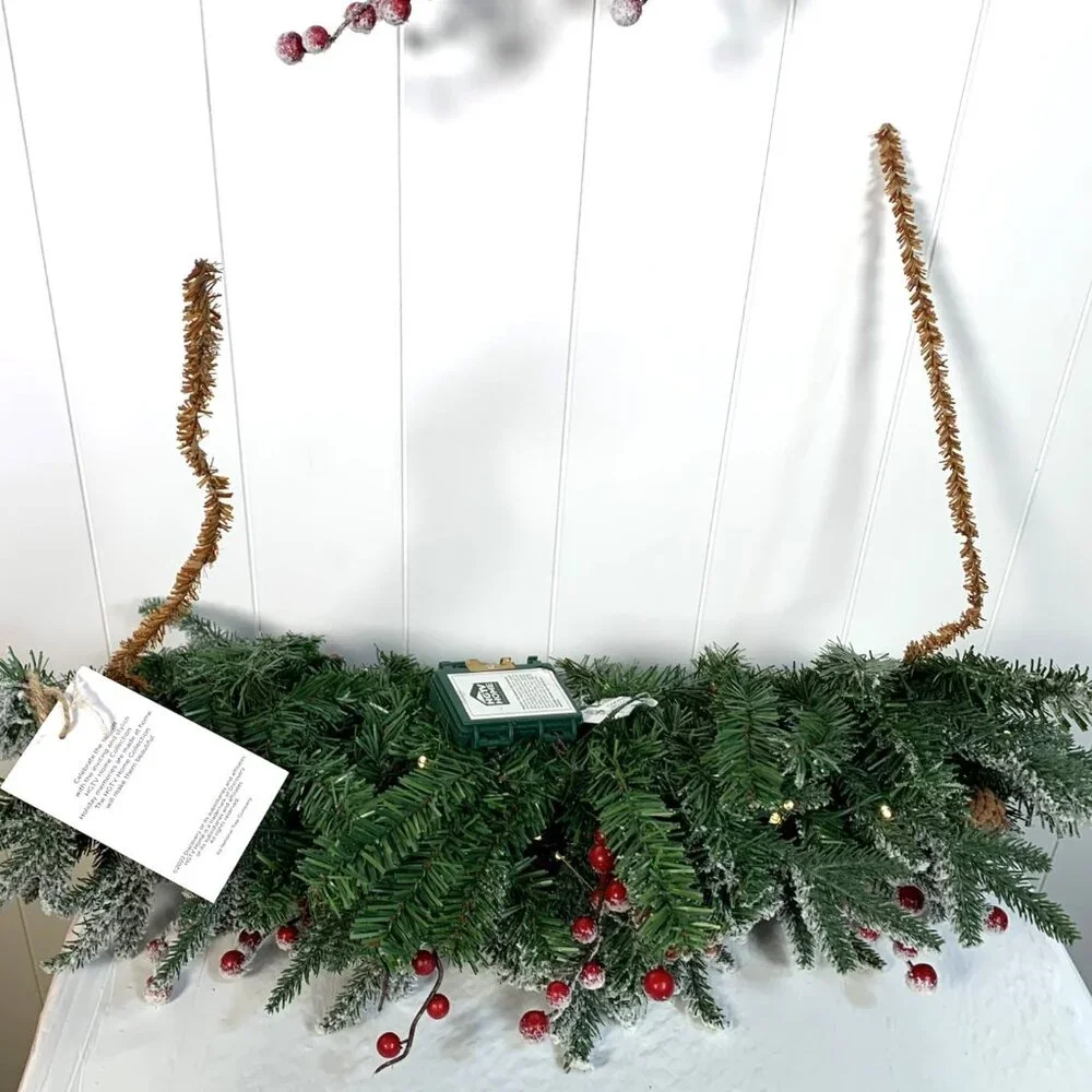 National Tree Company HGTV LED Pre-Lit Battery Timer Large Snowy Garland Swag